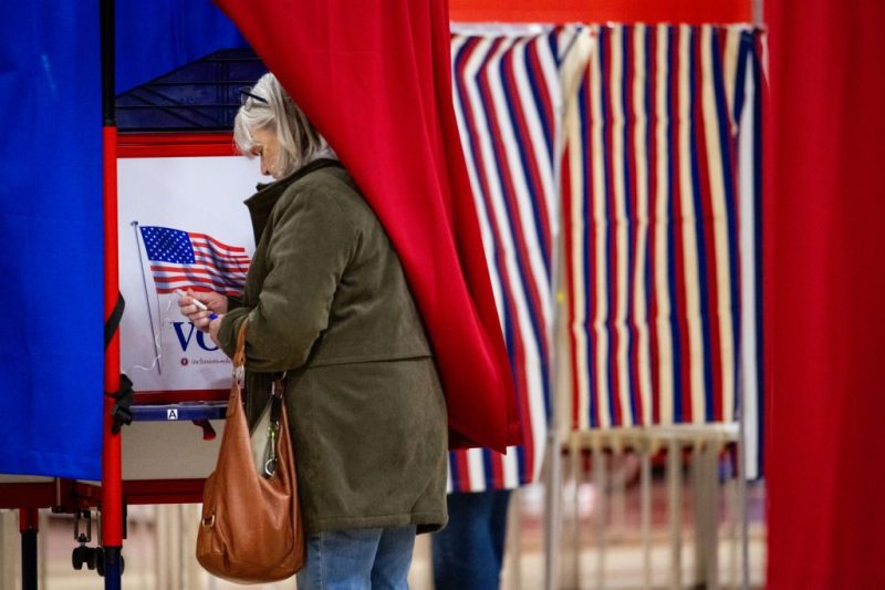 DERRY, NEW HAMPSHIRE - JANUARY 23: A voter casts their ballot in the New Hampshire Primary at Pinkerton Academy on January 23, 2024 in Derry, New Hampshire. People around the state are heading to the polls today to vote in the 2024 Primary Election. (Photo by Brandon Bell/Getty Images)