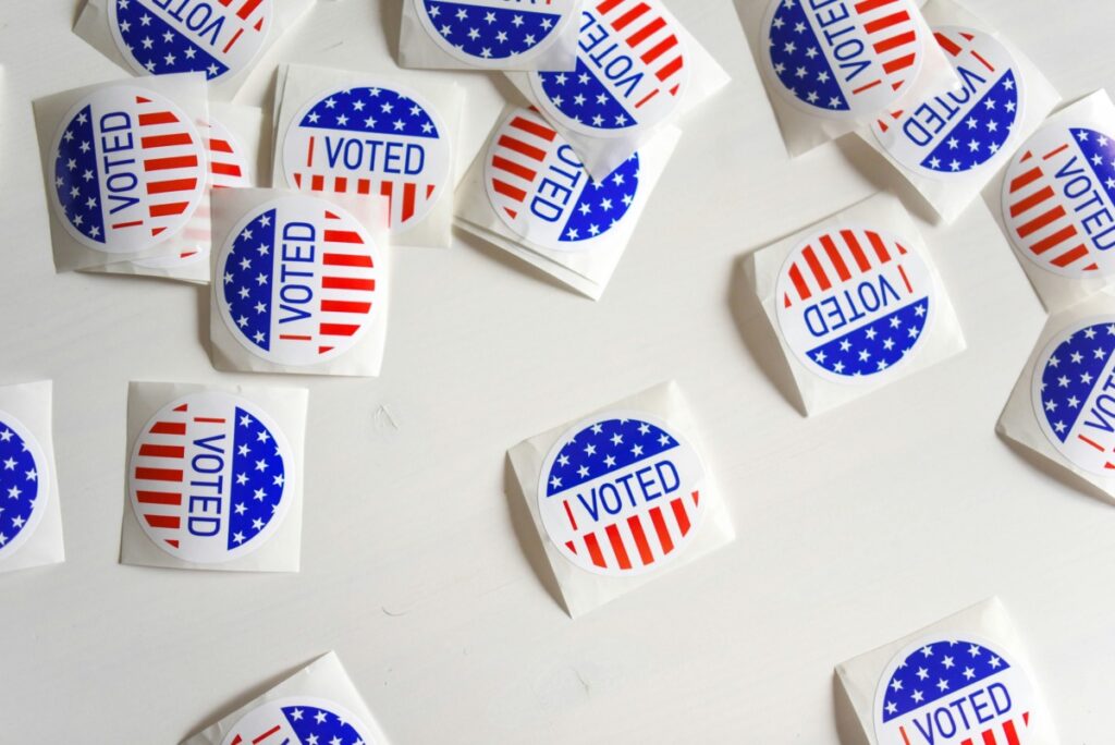 Pile of "Voted" stickers.
