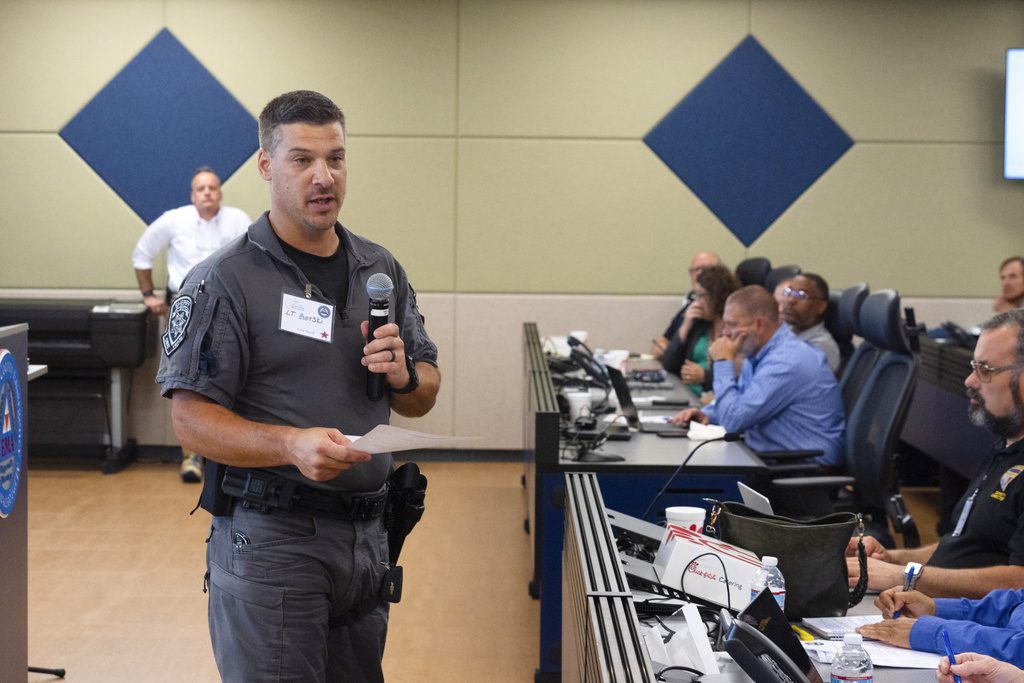 Lt. Shaun Gorski with the Cobb County Sheriff's Department, speaks during an election security training session at Cobb County Emergency Management headquarters, Aug. 23, 2024, in Marietta, Ga. (AP Photo/John Bazemore)