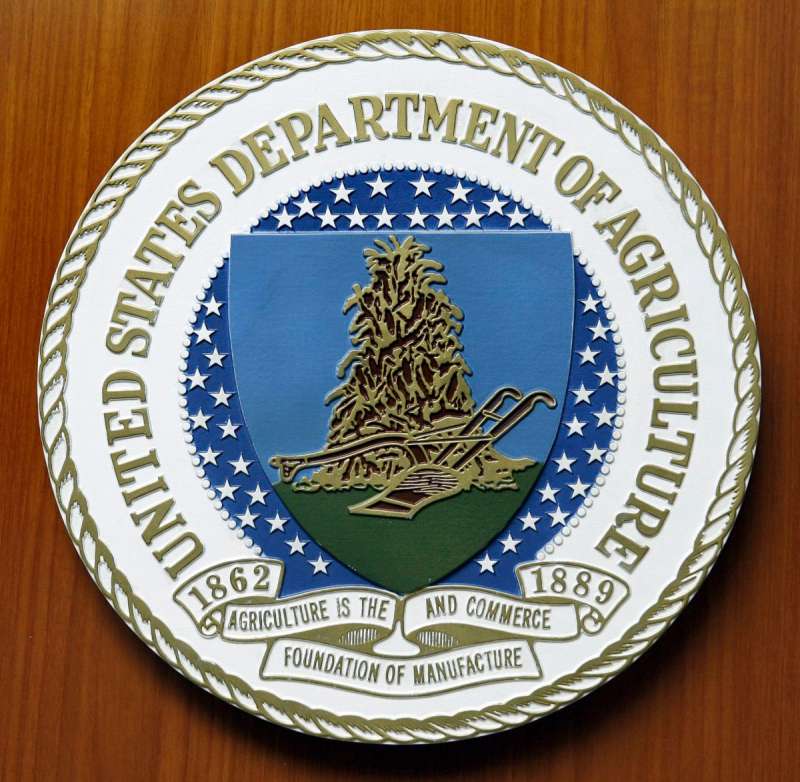The logo of the United States Department of Agriculture is seen, Aug. 10, 2007, at the US Embassy in Berlin. (AP Photo/Michael Sohn, File)